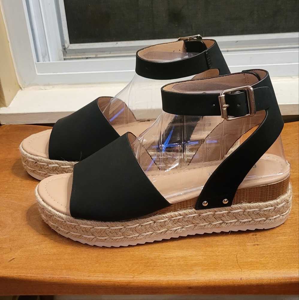 Womens Black wedge and also with ankle strap. Size 9M.